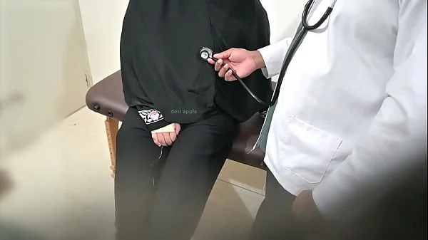 Doctor using muslim girl in clinic