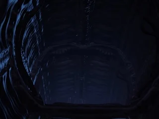 A sexy hottie gets fucked by a female alien in a cave