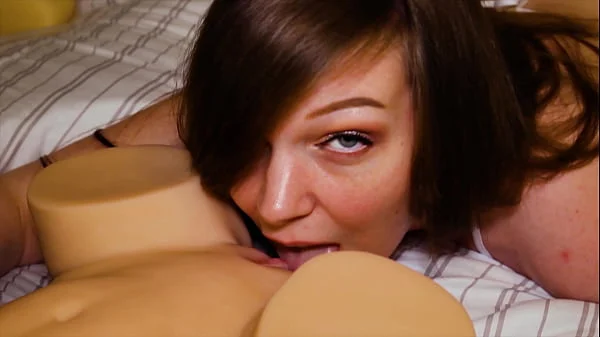 Sucking and fucking a huge breasted sex toy with my husband.